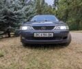 Синий Опель Вектра, объемом двигателя 1 л и пробегом 200 тыс. км за 1453 $, фото 1 на Automoto.ua