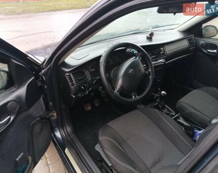 Синий Опель Вектра, объемом двигателя 1.8 л и пробегом 388 тыс. км за 2000 $, фото 15 на Automoto.ua