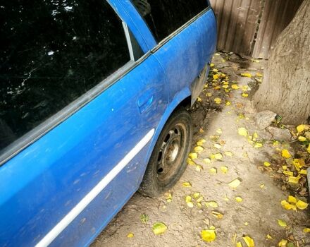 Синий Опель Вектра, объемом двигателя 1.8 л и пробегом 230 тыс. км за 1350 $, фото 6 на Automoto.ua