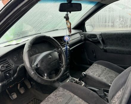 Синий Опель Вектра, объемом двигателя 1.6 л и пробегом 240 тыс. км за 1999 $, фото 6 на Automoto.ua