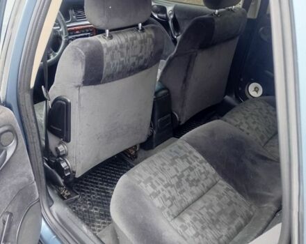 Синій Опель Вектра, об'ємом двигуна 2 л та пробігом 320 тис. км за 2300 $, фото 5 на Automoto.ua