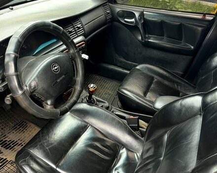 Синій Опель Вектра, об'ємом двигуна 2 л та пробігом 320 тис. км за 2000 $, фото 2 на Automoto.ua