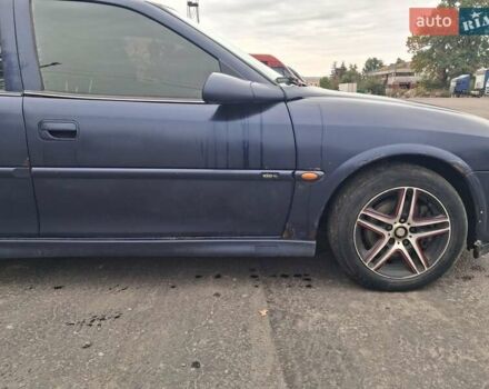 Синій Опель Вектра, об'ємом двигуна 2 л та пробігом 400 тис. км за 2300 $, фото 11 на Automoto.ua