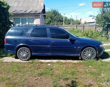 Синий Опель Вектра, объемом двигателя 2 л и пробегом 330 тыс. км за 1930 $, фото 2 на Automoto.ua