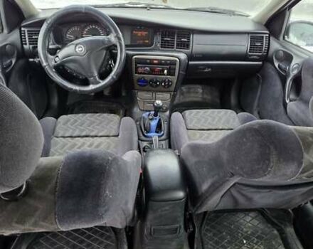 Синий Опель Вектра, объемом двигателя 1.8 л и пробегом 280 тыс. км за 2200 $, фото 9 на Automoto.ua