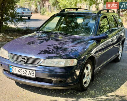 Синий Опель Вектра, объемом двигателя 2 л и пробегом 185 тыс. км за 2100 $, фото 1 на Automoto.ua