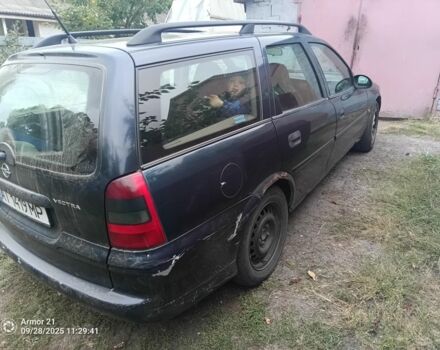 Синий Опель Вектра, объемом двигателя 2 л и пробегом 245 тыс. км за 1500 $, фото 2 на Automoto.ua