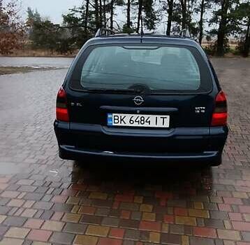 Синий Опель Вектра, объемом двигателя 1.6 л и пробегом 150 тыс. км за 1600 $, фото 4 на Automoto.ua