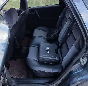 Синій Опель Вектра, об'ємом двигуна 1.6 л та пробігом 250 тис. км за 1800 $, фото 5 на Automoto.ua