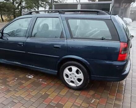 Синий Опель Вектра, объемом двигателя 1.6 л и пробегом 150 тыс. км за 1600 $, фото 3 на Automoto.ua