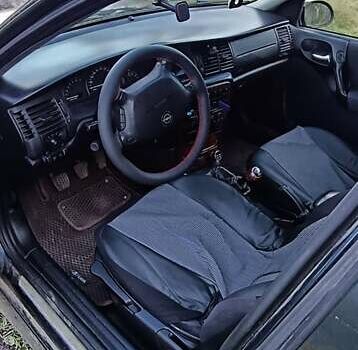 Синій Опель Вектра, об'ємом двигуна 1.6 л та пробігом 250 тис. км за 1800 $, фото 4 на Automoto.ua