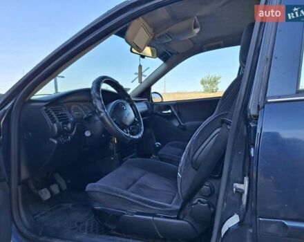 Синий Опель Вектра, объемом двигателя 2 л и пробегом 332 тыс. км за 2500 $, фото 7 на Automoto.ua