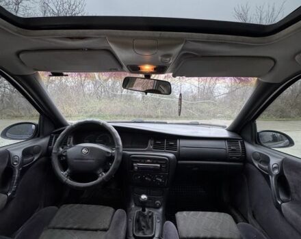 Синій Опель Вектра, об'ємом двигуна 1.6 л та пробігом 250 тис. км за 1500 $, фото 5 на Automoto.ua