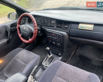 Синий Опель Вектра, объемом двигателя 1.8 л и пробегом 450 тыс. км за 1999 $, фото 21 на Automoto.ua