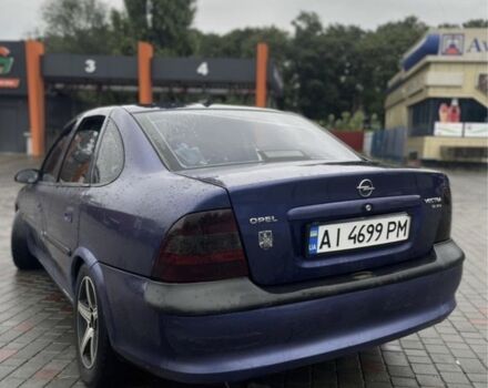 Синий Опель Вектра, объемом двигателя 1.8 л и пробегом 312 тыс. км за 1450 $, фото 1 на Automoto.ua
