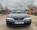 Синий Опель Вектра, объемом двигателя 1.8 л и пробегом 450 тыс. км за 1999 $, фото 1 на Automoto.ua