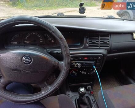 Синий Опель Вектра, объемом двигателя 1.79 л и пробегом 274 тыс. км за 1600 $, фото 14 на Automoto.ua