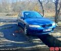 Синій Опель Вектра, об'ємом двигуна 2 л та пробігом 320 тис. км за 2000 $, фото 1 на Automoto.ua