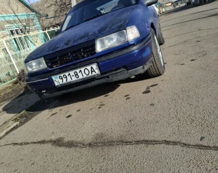 Синий Опель Вектра, объемом двигателя 1 л и пробегом 280 тыс. км за 900 $, фото 1 на Automoto.ua