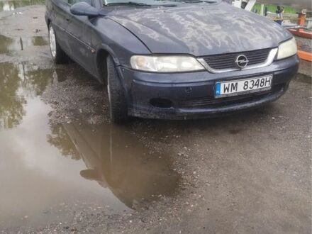 Синий Опель Вектра, объемом двигателя 2.2 л и пробегом 300 тыс. км за 1000 $, фото 1 на Automoto.ua