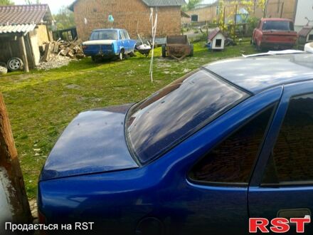 Синий Опель Вектра, объемом двигателя 2 л и пробегом 100 тыс. км за 450 $, фото 1 на Automoto.ua