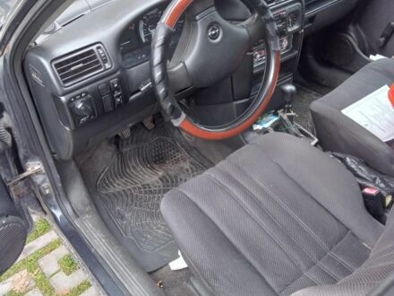 Синий Опель Вектра, объемом двигателя 1.6 л и пробегом 312 тыс. км за 609 $, фото 1 на Automoto.ua