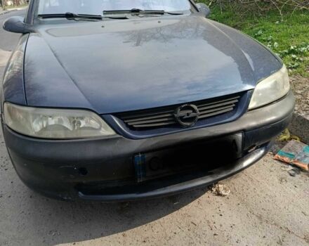 Синий Опель Вектра, объемом двигателя 1.8 л и пробегом 240 тыс. км за 1550 $, фото 1 на Automoto.ua