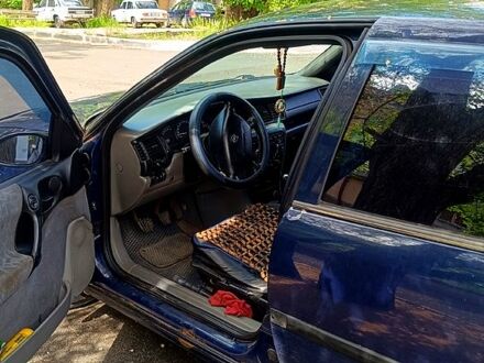 Синій Опель Вектра, об'ємом двигуна 2 л та пробігом 385 тис. км за 1300 $, фото 1 на Automoto.ua