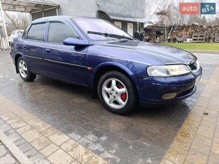 Синий Опель Вектра, объемом двигателя 1.8 л и пробегом 264 тыс. км за 1700 $, фото 1 на Automoto.ua