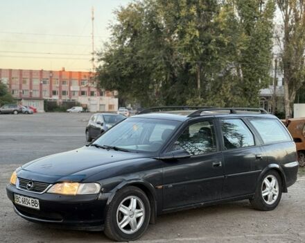 Синий Опель Вектра, объемом двигателя 1.8 л и пробегом 300 тыс. км за 1254 $, фото 1 на Automoto.ua
