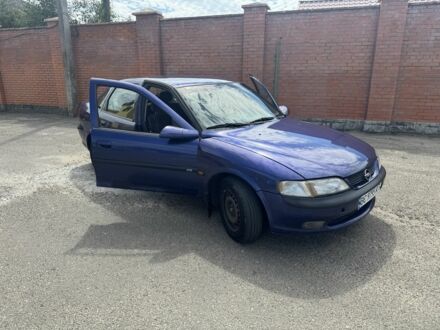Синий Опель Вектра, объемом двигателя 1.8 л и пробегом 247 тыс. км за 1999 $, фото 1 на Automoto.ua