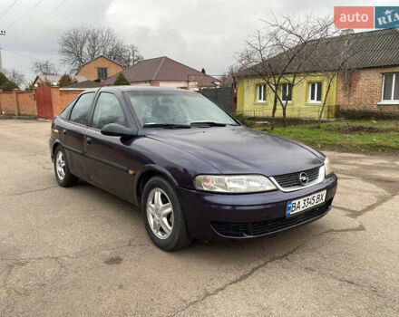 Синий Опель Вектра, объемом двигателя 1.8 л и пробегом 450 тыс. км за 1999 $, фото 1 на Automoto.ua