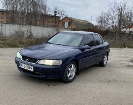 Синий Опель Вектра, объемом двигателя 1.8 л и пробегом 100 тыс. км за 1750 $, фото 1 на Automoto.ua