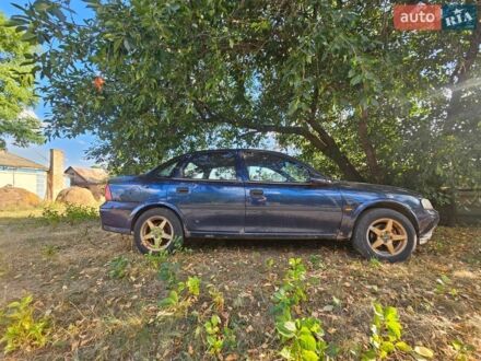 Синий Опель Вектра, объемом двигателя 1.6 л и пробегом 300 тыс. км за 1900 $, фото 1 на Automoto.ua