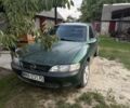 Зелений Опель Вектра, об'ємом двигуна 2 л та пробігом 320 тис. км за 698 $, фото 2 на Automoto.ua