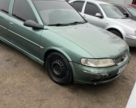 Зеленый Опель Вектра, объемом двигателя 2 л и пробегом 290 тыс. км за 1300 $, фото 1 на Automoto.ua