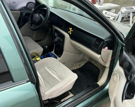 Зеленый Опель Вектра, объемом двигателя 2 л и пробегом 290 тыс. км за 1300 $, фото 4 на Automoto.ua