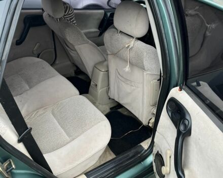Зеленый Опель Вектра, объемом двигателя 2 л и пробегом 290 тыс. км за 1300 $, фото 6 на Automoto.ua