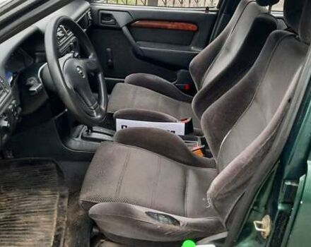 Зелений Опель Вектра, об'ємом двигуна 2 л та пробігом 263 тис. км за 1300 $, фото 6 на Automoto.ua