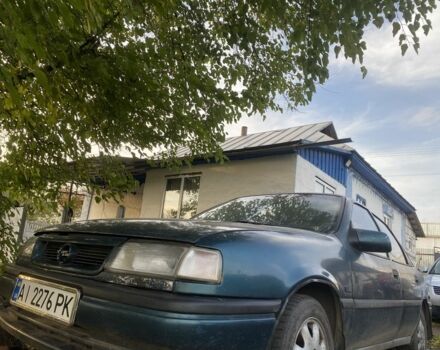 Зеленый Опель Вектра, объемом двигателя 1.6 л и пробегом 395 тыс. км за 950 $, фото 1 на Automoto.ua