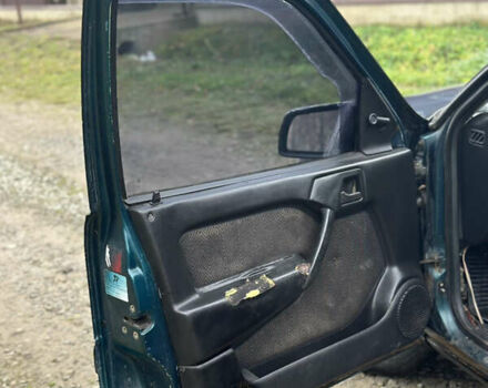 Зеленый Опель Вектра, объемом двигателя 1.8 л и пробегом 309 тыс. км за 999 $, фото 17 на Automoto.ua