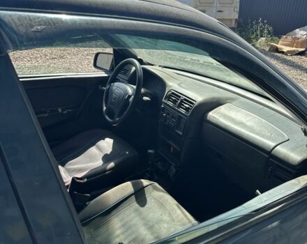 Зеленый Опель Вектра, объемом двигателя 1.8 л и пробегом 480 тыс. км за 999 $, фото 7 на Automoto.ua