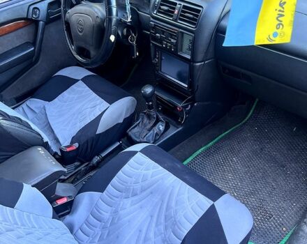 Зелений Опель Вектра, об'ємом двигуна 2 л та пробігом 253 тис. км за 1350 $, фото 3 на Automoto.ua