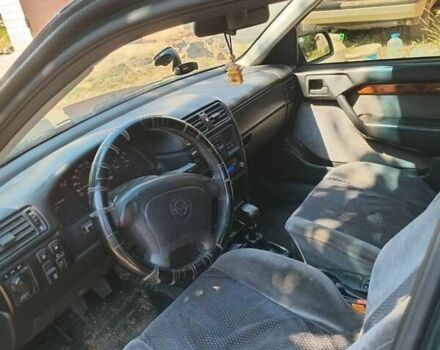 Зелений Опель Вектра, об'ємом двигуна 2 л та пробігом 431 тис. км за 1400 $, фото 4 на Automoto.ua