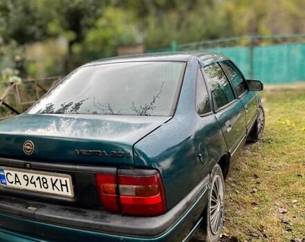Зеленый Опель Вектра, объемом двигателя 2 л и пробегом 319 тыс. км за 1750 $, фото 2 на Automoto.ua
