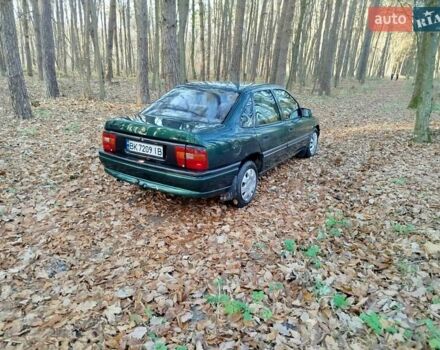 Зеленый Опель Вектра, объемом двигателя 1.7 л и пробегом 250 тыс. км за 1390 $, фото 2 на Automoto.ua