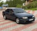 Зеленый Опель Вектра, объемом двигателя 2 л и пробегом 288 тыс. км за 1650 $, фото 1 на Automoto.ua