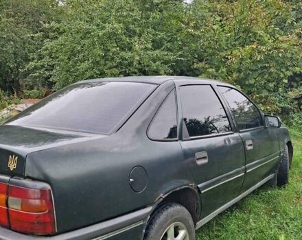 Зеленый Опель Вектра, объемом двигателя 2 л и пробегом 456 тыс. км за 1150 $, фото 4 на Automoto.ua