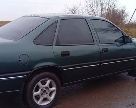 Зеленый Опель Вектра, объемом двигателя 2 л и пробегом 350 тыс. км за 1450 $, фото 1 на Automoto.ua