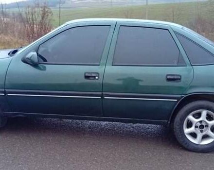 Зеленый Опель Вектра, объемом двигателя 2 л и пробегом 350 тыс. км за 1450 $, фото 3 на Automoto.ua